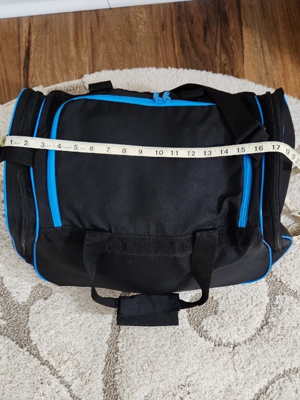 Adidas Black Duffel Bag with Bright Blue Accents